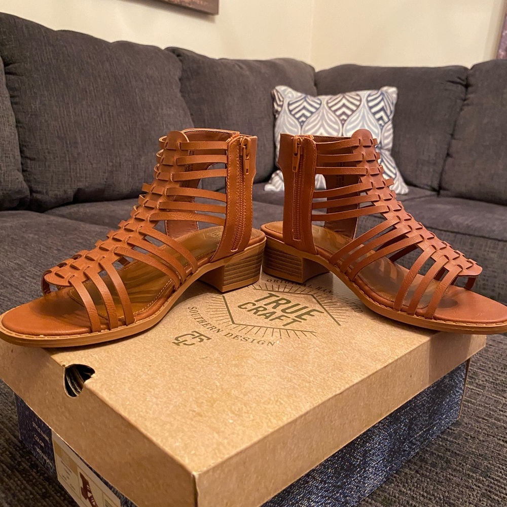True Craft little girl size 3 sandals. Cognac (brown) in color. Never worn